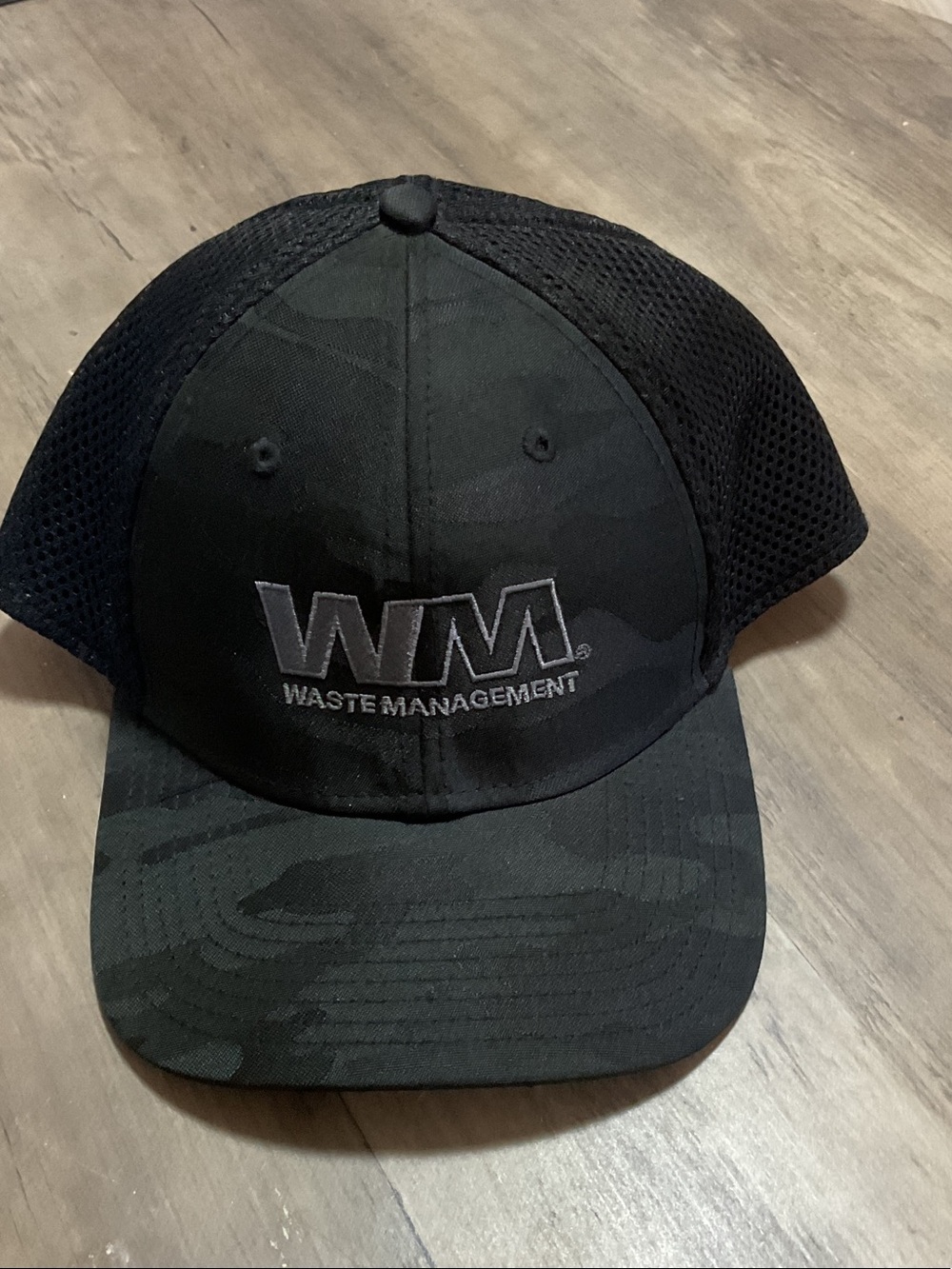 New Era Black WM Waste Management Trucker Cap